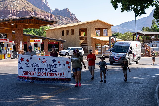 Zion_Forever_staff_walk_with_a_banner